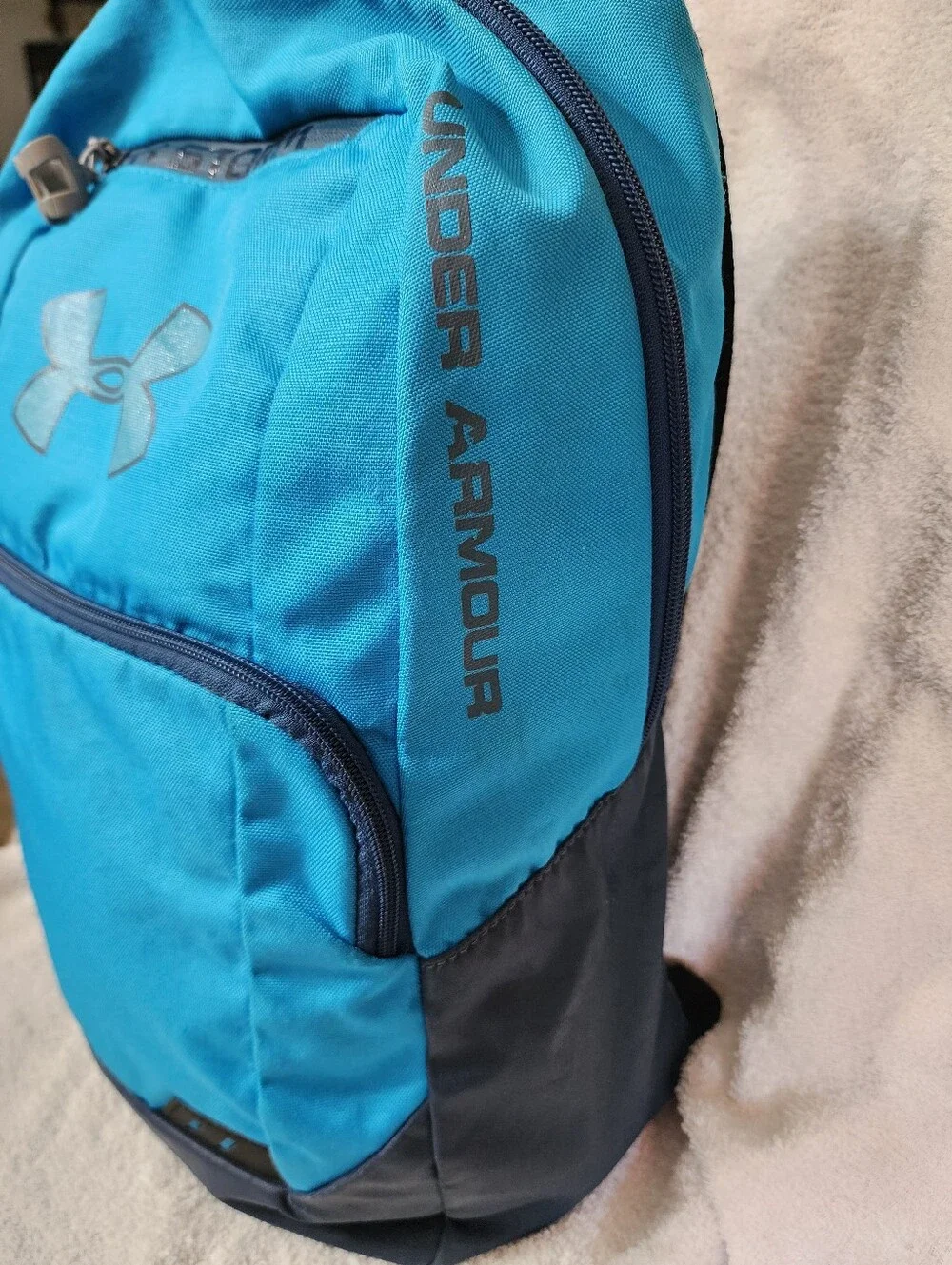 M.169- Under Armour Storm Backpack, blue teal, USED